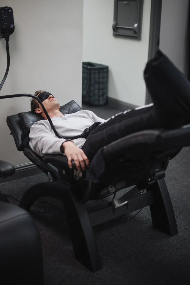 Staff preparing smoothies behind the counter at Summit Athletic Club’s smoothie bar