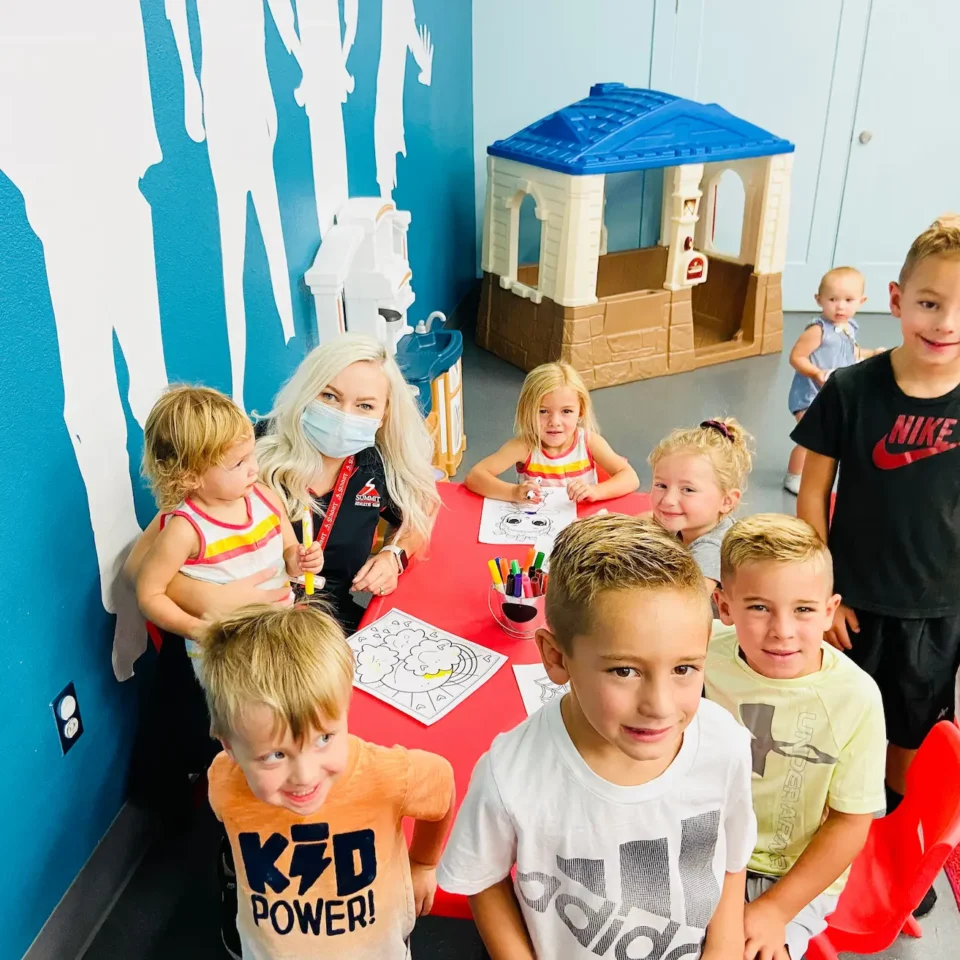 Staff preparing smoothies behind the counter at Summit Athletic Club’s smoothie bar