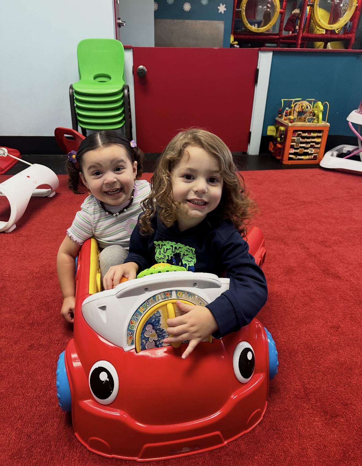 Children smiling together at Summit Kids Club
